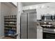 Well-organized kitchen with stainless steel appliances and a walk-in pantry at 123 Ashford Cir, Atlanta, GA 30338