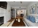 Cozy living room with a fireplace, contemporary decor, and an open layout at 123 Ashford Cir, Atlanta, GA 30338