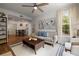 Open-concept living room with a view into the dining area, creating a spacious feel at 123 Ashford Cir, Atlanta, GA 30338