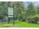 Lush green park with mature trees and inviting walking paths offering a serene escape at 1634 Ponce De Leon Ne Ave # 512, Atlanta, GA 30307