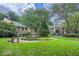 Charming townhomes surround a lush green courtyard with manicured landscaping and mature trees at 1634 Ponce De Leon Ne Ave # 512, Atlanta, GA 30307