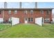 Private backyard with lawn, fence, and patio, perfect for outdoor entertaining and relaxation at 215 Morris Ln, Woodstock, GA 30188