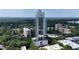 High-rise building and surrounding landscape captured in an aerial shot at 2828 Peachtree Nw Rd # 2002, Atlanta, GA 30305