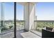 Outdoor balcony with wrought iron railings offering expansive city views at 2828 Peachtree Nw Rd # 2002, Atlanta, GA 30305