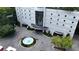 Stately building with a fountain at the entrance and lush landscaping creates a welcoming exterior appeal at 2828 Peachtree Nw Rd # 2002, Atlanta, GA 30305