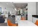 Open-concept kitchen and living area with sleek countertops, creating an inviting space for cooking and socializing at 2828 Peachtree Nw Rd # 2002, Atlanta, GA 30305