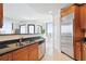 Modern kitchen features stainless steel appliances, granite countertops and a stainless steel double sink at 2828 Peachtree Nw Rd # 2002, Atlanta, GA 30305