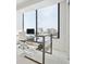 Bright office space with a large window overlooking the city skyline at 2828 Peachtree Nw Rd # 2002, Atlanta, GA 30305