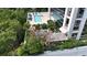 Rooftop pool surrounded by lush greenery and trees offering a private oasis with city views at 2828 Peachtree Nw Rd # 2002, Atlanta, GA 30305