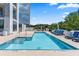 A stylish outdoor pool with comfortable lounge chairs, perfect for relaxing and enjoying sunny days at 2828 Peachtree Nw Rd # 2002, Atlanta, GA 30305
