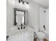 Modern bathroom featuring new vanity, mirror and fixtures at 3072 Revere Ct, Atlanta, GA 30340