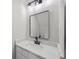 Stylish bathroom features new mirror, white cabinets, and countertops at 3072 Revere Ct, Atlanta, GA 30340