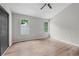 Bright bedroom with wood floors, natural light, and modern ceiling fan at 3072 Revere Ct, Atlanta, GA 30340