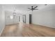 Bright living room featuring luxury vinyl flooring and stylish lighting at 3072 Revere Ct, Atlanta, GA 30340
