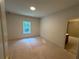 Bedroom with attached bath, offering an en-suite experience and privacy at 4110 Post Gate Ct, Cumming, GA 30040