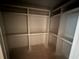 Spacious walk-in closet with custom shelving at 4110 Post Gate Ct, Cumming, GA 30040