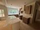 Kitchen featuring custom cabinets and a marble countertop island at 4110 Post Gate Ct, Cumming, GA 30040