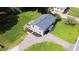Aerial view of the home showcasing the roof, landscaping, and driveway at 1042 Oakdale Se Dr, Smyrna, GA 30080