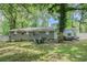 Spacious backyard with a patio and a fire pit, perfect for outdoor gatherings and relaxation at 200 Robin Hood Ln, Hampton, GA 30228