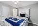 Bedroom with ensuite bathroom access and comfortable furnishings at 200 Robin Hood Ln, Hampton, GA 30228
