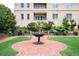 Beautiful courtyard showcasing greenery and decorative fountain at the property at 3657 Peachtree Ne Rd # 4A, Atlanta, GA 30319