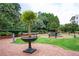 Stunning courtyard with a fountain, lush landscaping and walking paths at 3657 Peachtree Ne Rd # 4A, Atlanta, GA 30319