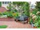 Secluded courtyard showcasing lush landscaping and comfortable bench seating at 3657 Peachtree Ne Rd # 4A, Atlanta, GA 30319