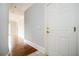 Bright hallway with beautiful hardwood floors and white trim in a luxurious apartment at 3657 Peachtree Ne Rd # 4A, Atlanta, GA 30319