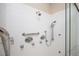 Shower with white tile and multiple shower heads, including a handheld shower at 3657 Peachtree Ne Rd # 4A, Atlanta, GA 30319