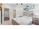 Neutral bedroom featuring a queen bed and a doorway to the bathroom at 3860 Oxford Park Ln, Cumming, GA 30040