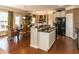 Open concept kitchen with granite countertops, stainless steel appliances, and an island sink at 5110 Mulberry Pass Ct, Hoschton, GA 30548