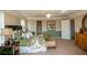 Comfortable main bedroom with a bed that is warmly lit and has lots of pillows, and also has an extra door at 5110 Mulberry Pass Ct, Hoschton, GA 30548