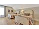 Stylish bedroom with two beds, hardwood floors, and soft lighting creates a comfortable and inviting space to unwind at 150 Ray Way, Chattahoochee Hills, GA 30268