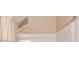 Shower detail with modern square shower head and neutral white color at 1727 Shire Village Dr, Sugar Hill, GA 30518
