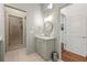 Well-lit bathroom featuring granite countertop, a walk in shower and neutral colors at 422 Bill Kennedy Se Way, Atlanta, GA 30316