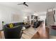 Inviting living room featuring an open layout, hardwood floors, modern furnishings, and natural light at 422 Bill Kennedy Se Way, Atlanta, GA 30316