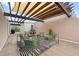 A rooftop patio with string lights, a modern outdoor rug, and outdoor seating at 422 Bill Kennedy Se Way, Atlanta, GA 30316