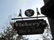 The 'Vickery's Bar & Grill' sign stands out against a neutral sky, adorned with lights at 422 Bill Kennedy Se Way, Atlanta, GA 30316