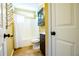 Cozy bathroom featuring a shower-tub combination and dark wood vanity at 5427 Highway 81, Loganville, GA 30052