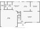 Detailed floor plan showcasing the layout of the main level, including the kitchen, living room, and garage at 5427 Highway 81, Loganville, GA 30052