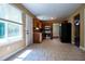 Bright kitchen featuring stainless steel appliances, and natural light through a large window at 5427 Highway 81, Loganville, GA 30052