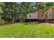 Well-maintained backyard with a spacious deck, perfect for outdoor entertaining and relaxation at 5714 Braddock Ct, Atlanta, GA 30350