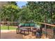 Deck features comfortable outdoor seating and overlooks a private backyard at 5714 Braddock Ct, Atlanta, GA 30350