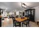 Open dining area connecting to the living room, showcasing stylish decor and lighting at 5714 Braddock Ct, Atlanta, GA 30350