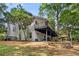 Two story home featuring a spacious deck, offering outdoor living and scenic views at 5714 Braddock Ct, Atlanta, GA 30350