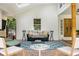 Inviting front porch with comfortable seating, stylish decor, and natural light at 5714 Braddock Ct, Atlanta, GA 30350