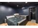 Home theater with custom black paint, projection screen, and secure vault at 5714 Braddock Ct, Atlanta, GA 30350