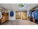 Spacious walk-in closet with ample storage, a skylight, and unique patterned floors for added style at 5714 Braddock Ct, Atlanta, GA 30350