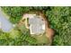 Aerial view of a home with intricate landscaping and a private driveway at 930 Shepards Ct, Roswell, GA 30075