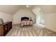 Bedroom showcasing stylish neutral carpet, a cozy bed, and a large window for natural light at 930 Shepards Ct, Roswell, GA 30075